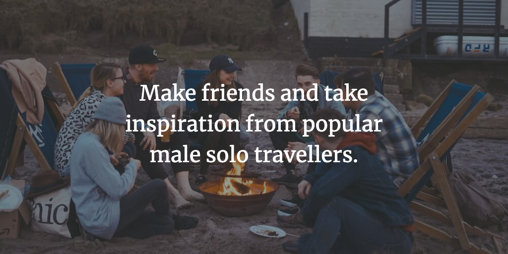 The text reads, 'Make friends and take inspiration from popular male solo travellers.' A group of travel friends sit around a camp fire.
