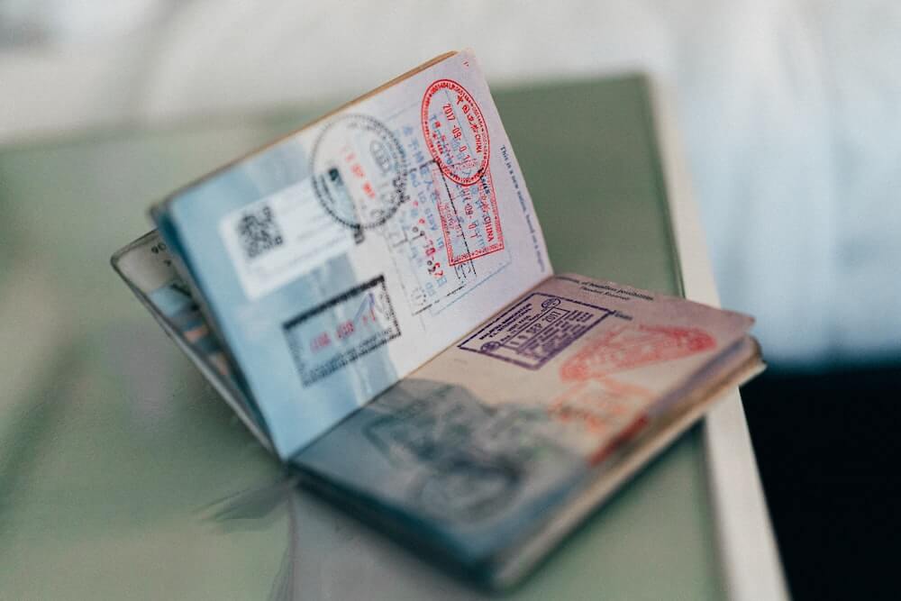 An open passport with stamps and visas.