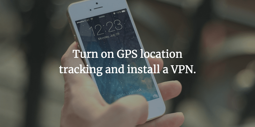 The text reads, 'Turn on GPS location tracking and install a VPN when travelling alone.' An iPhone held in a hand.