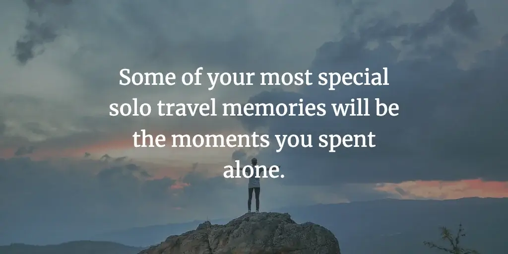 A backpacker standing on a mountain top watching sunset. The text reads, 'Some of your most special solo travel memories will be the moments you spent alone.'
