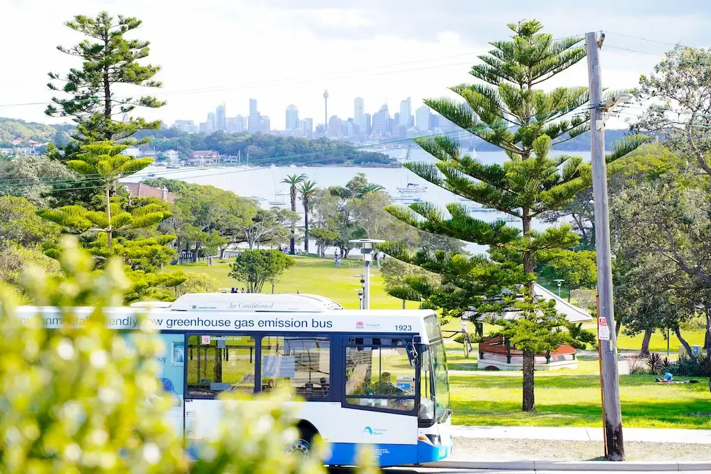 A public bus driving around Sydney, Australia.