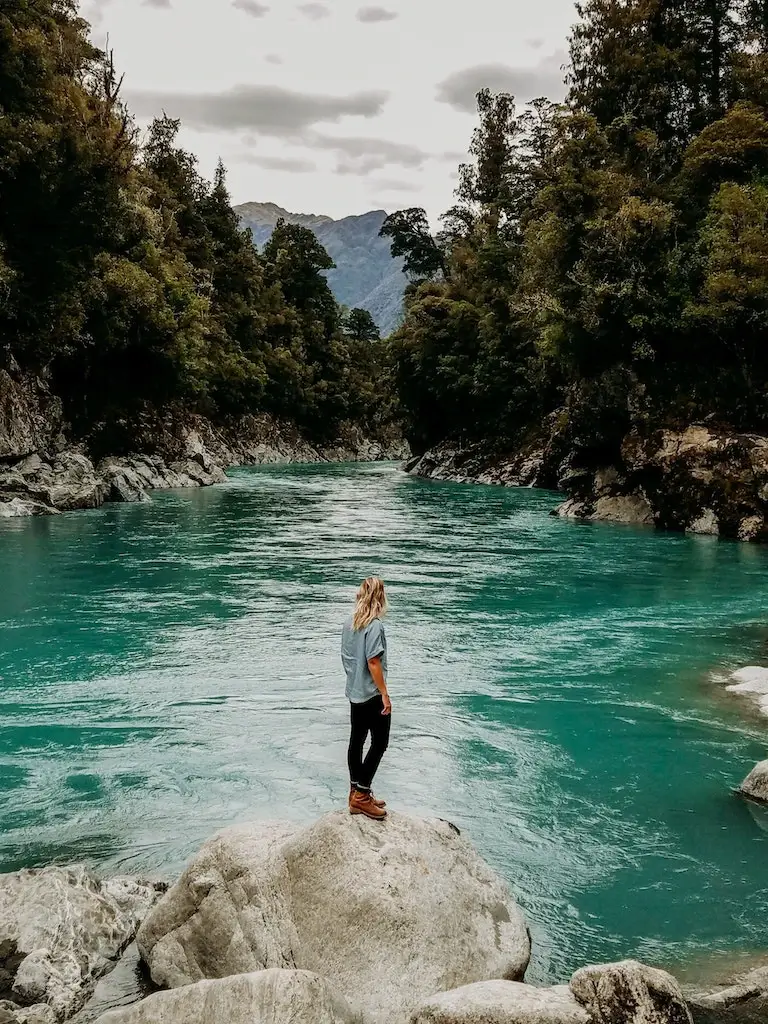 A female solo travelling to Hokitika Gorge on the West Coast of the South Island, New Zealand.