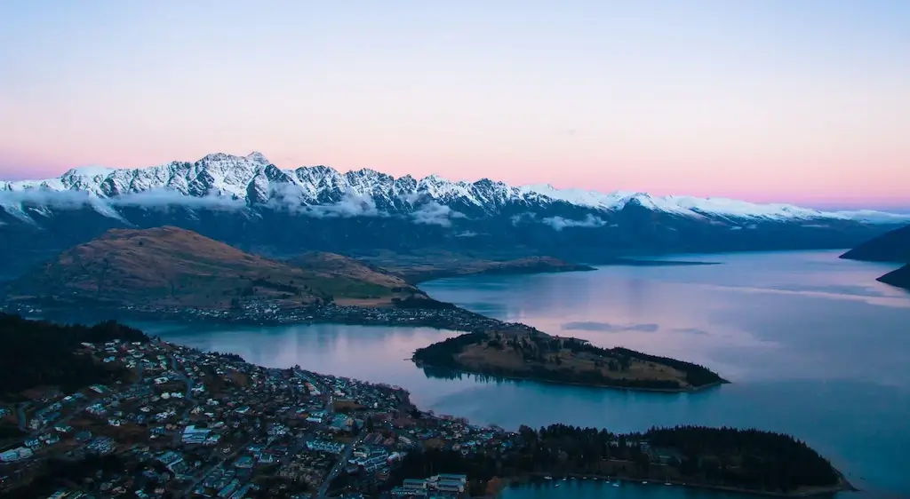 Sunset over The Remarkables and Queenstown, New Zealand.