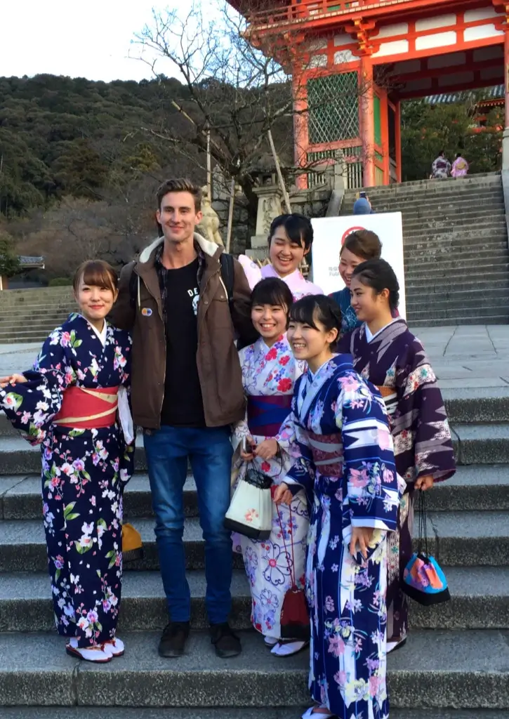Harry (founder of Nomadic Yak) with geishas in Kyoto, Japan.