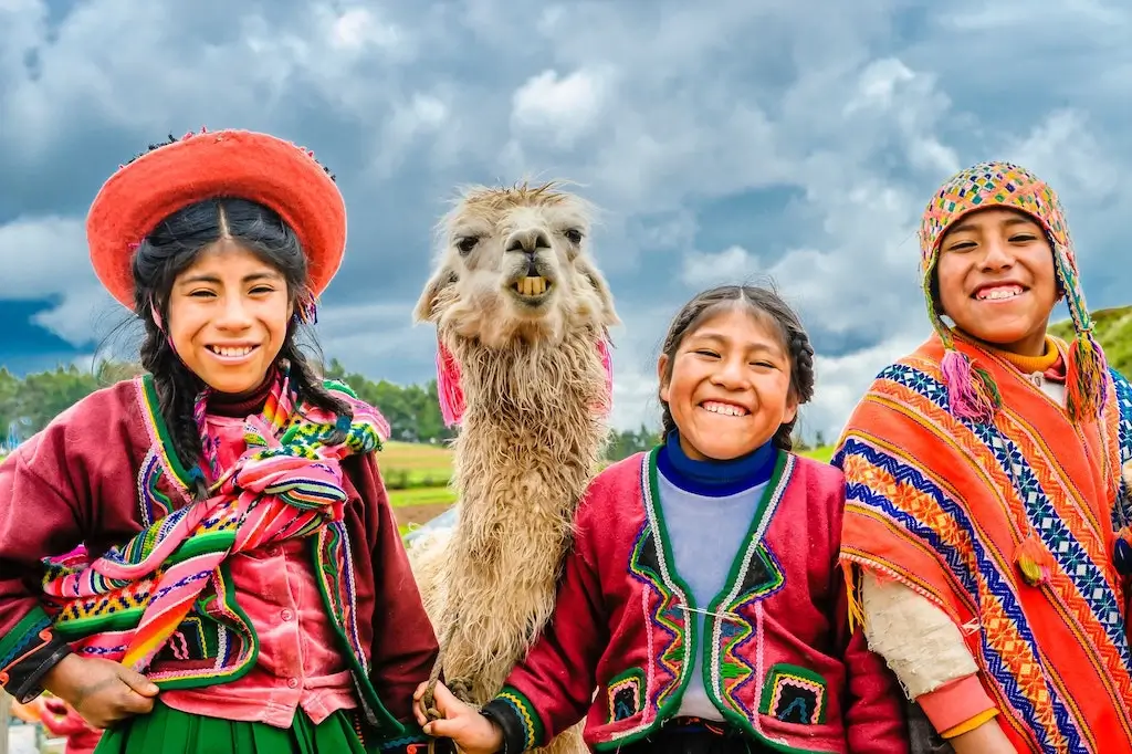 Peruvian children smiling in the Andes