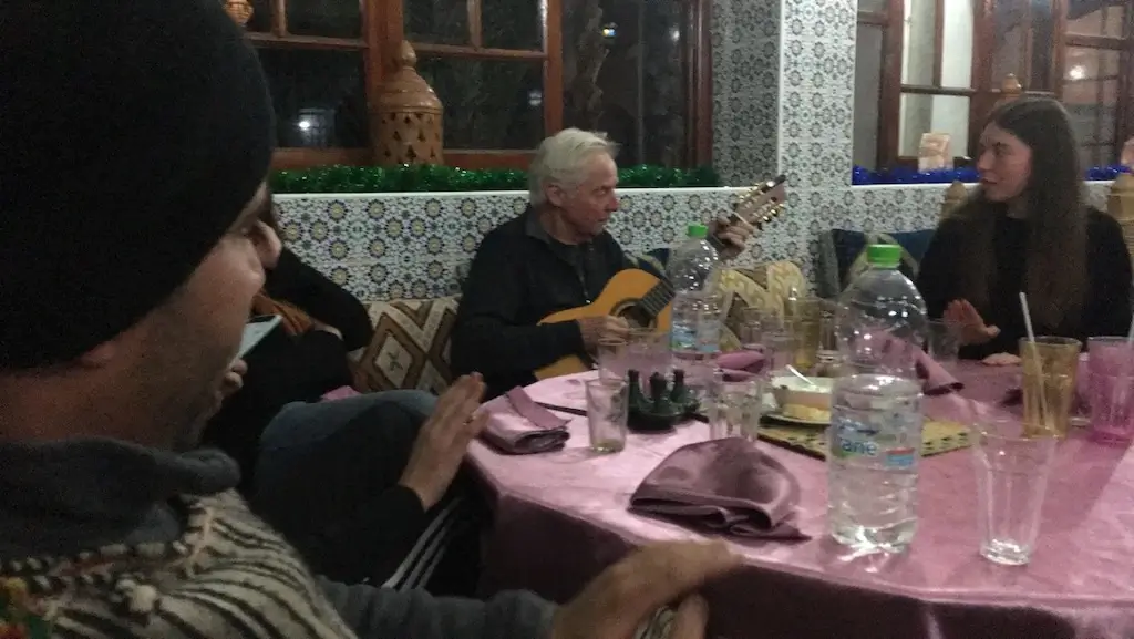 Patty (my Kiwi friend) playing my guitar in a hotel in Morocco
