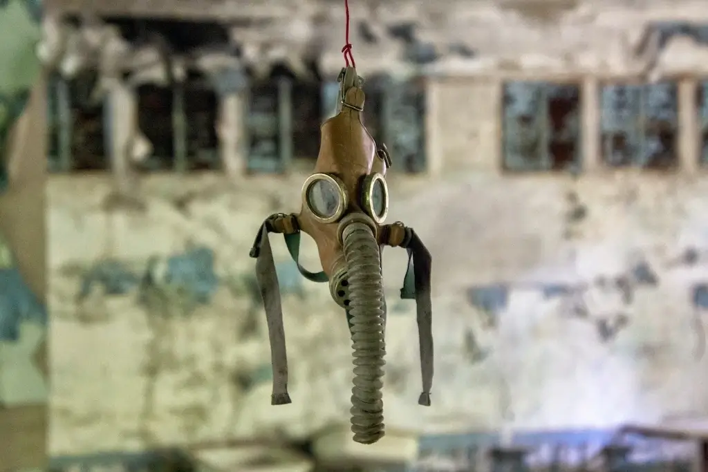 Gas mask hanging in the Chernobyl nuclear disaster site.