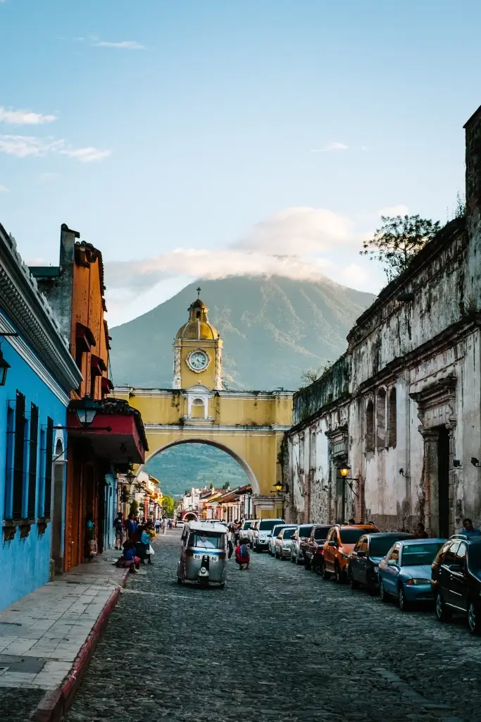 Volcano overlooking a street in Antigua, Guatemala. 