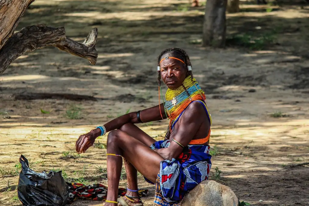 Tribal woman wearing traditional clothing and beads in Mozambique.