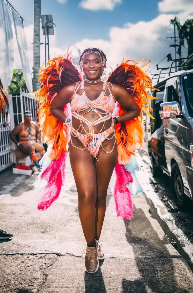 Local woman dressed brightly with wings for Carnival Festival in Trinidad and Tobago. 